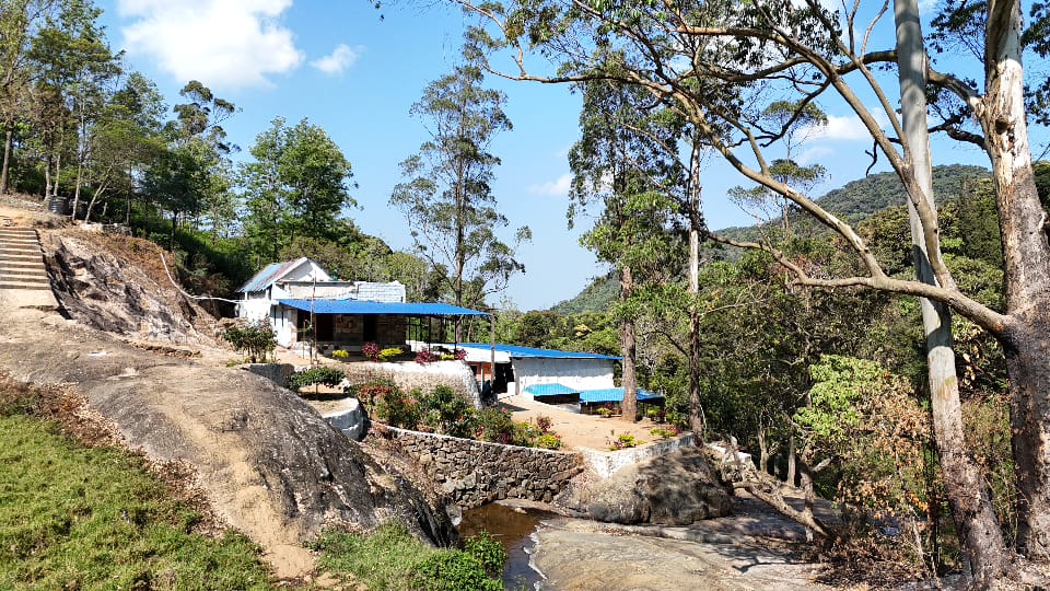 Megamalai Kubendiran Resort hill view exterior in High Wavy Mountains