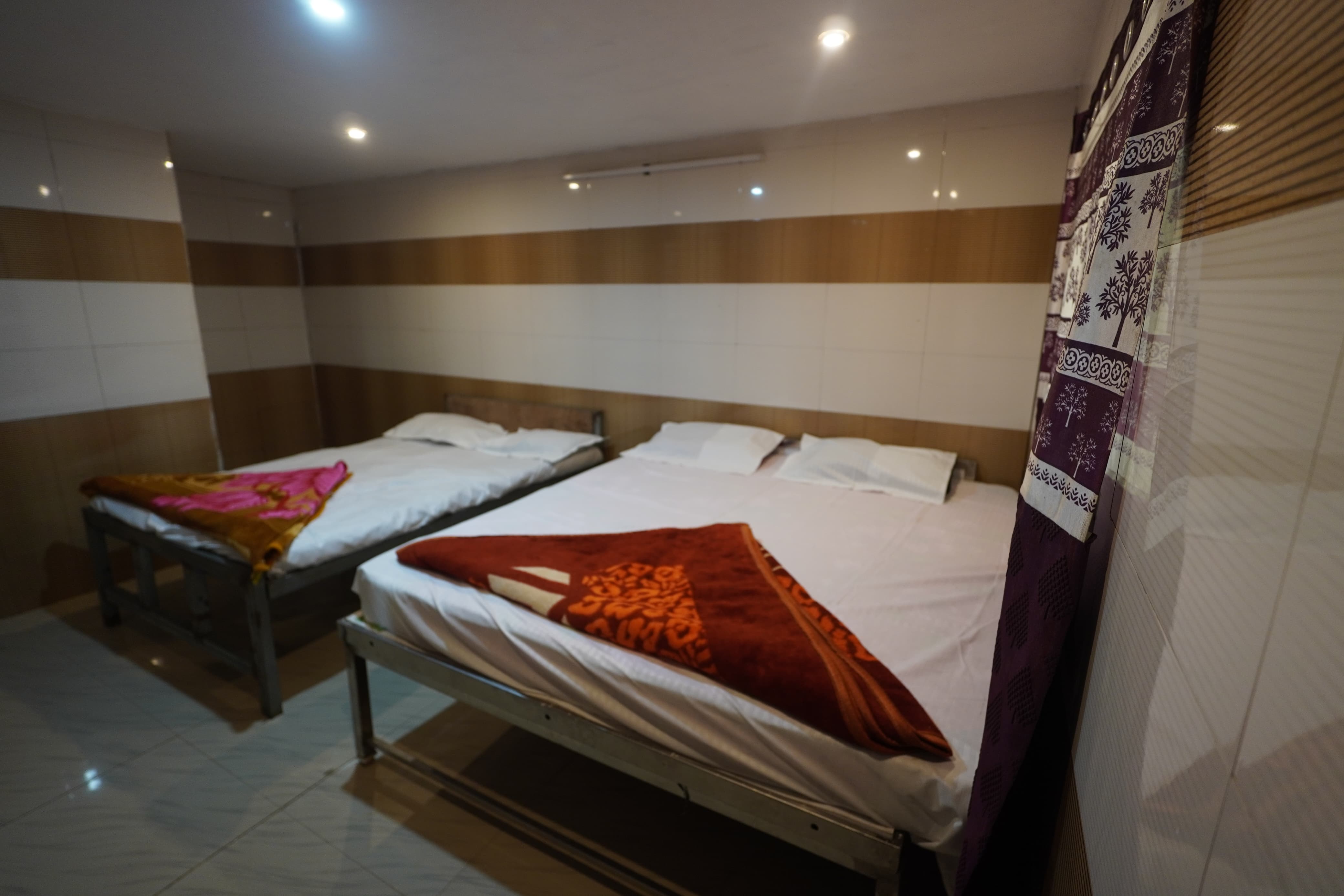 Luxury rooms at Megamalai Kubendiran Resort with scenic mountain view